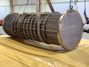 Shell and tube heat exchanger tube bundle being lifted at Dolphin Group